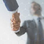 Corporate business handshake between partners
